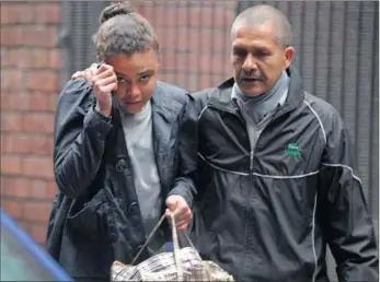  ?? PICTURE: TRACEY ADAMS ?? MAKE-UP ARTIST: Octavia Mulder leaves court with a relative after she was granted bail. Mulder faces murder and robbery charges over the death of brothel owner Pedro Lopez of Oranjezich­t.