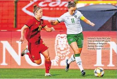  ?? SPORTSFILE ?? Ireland’s Katie McCabe tries to shake off Laura Deloose of Belgium during the sides’ friendly clash