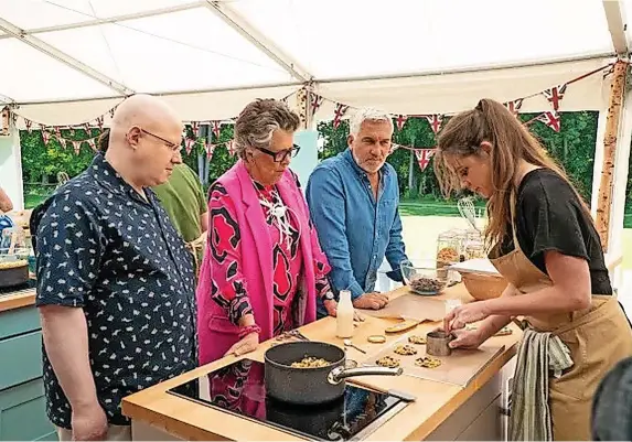  ?? Channel 4 ?? > Judges Prue Leith and Paul Hollywood with host Matt Lucas inspecting a contestant’s bake in the 2020 season of Great British Bake Off