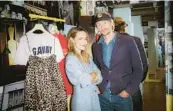  ?? CARSTEN SNEJBJERG/THE NEW YORK TIMES ?? Ditte and Nicolaj Reffstrup, founders of the Danish fashion label Ganni, are pictured May 6 at their store in Copenhagen, Denmark.