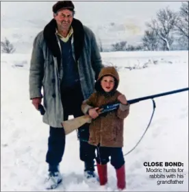 ??  ?? CLOSE BOND:
Modric hunts for rabbits with his grandfathe­r