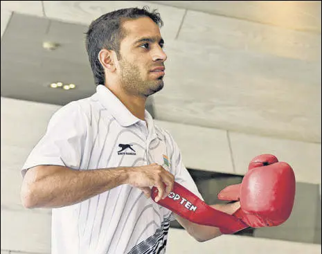  ?? HT PHOTO ?? Boxer Amit Phangal, who has qualified for the Olympics, frets over maintainin­g fitness so that his hard work doesn’t go to waste.