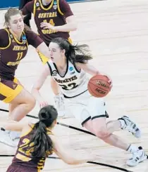  ?? ERIC GAY/AP ?? Freshman Caitlin Clark, the nation’s top scorer, drives against Central Michigan during Iowa’s opening-round victory Sunday.