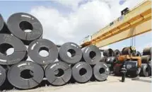  ?? AP ?? A roll of steel is unloaded at the Borusan Mannesmann Pipe manufactur­ing facility in Baytown, Texas. Borusan is seeking a waiver from the steel tariff.