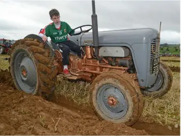  ??  ?? Ger Cummins (16), from Bandon, pictured during his first ploughing competitio­n in the Confined Vintage Class at the annual ploughing match at Clogagh, Co Cork.