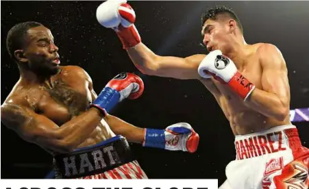  ?? Photo: STACEY VERBEEK ?? BRAVO! Ramirez rocks Hart in another hard-fought affair between the two