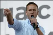  ?? PAVEL GOLOVKIN — THE ASSOCIATED PRESS FILE ?? Activist Alexei Navalny speaks to a crowd during a political protest in Moscow, Russia.