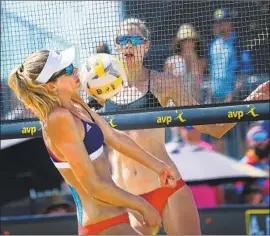  ?? Christina House Los Angeles Times ?? ALIX KLINEMAN, left, tries a dig as Sarah Pavan looks on in the women’s final of the Manhattan Beach Open. Pavan and Melissa Humana-Paredes swept to win.