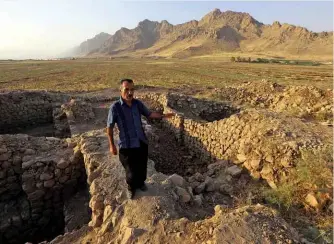  ??  ?? ABOVE: The ancient city of Qalatga Darband, believed to have been founded in 331 BC by Alexander the Great, was discovered by a team of Iraqi and British archæologi­sts. BELOW: The trepanned cow skull.