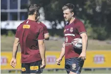  ?? Picture: ADAM HEAD ?? Daly Cherry-Evans and Cameron Munster at training.