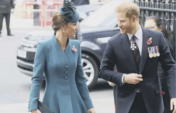  ??  ?? 0 Prince Harry with the Duchess of Cambridge at Westminste­r Abbey. Below Prince William met with Prime Minister Jacinda Ardern on a visit to New Zealand