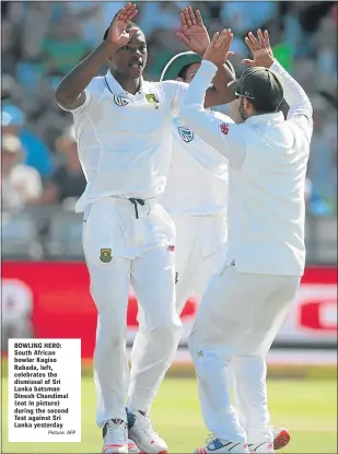  ?? Picture: AFP ?? BOWLING HERO: South African bowler Kagiso Rabada, left, celebrates the dismissal of Sri Lanka batsman Dinesh Chandimal (not in picture) during the second Test against Sri Lanka yesterday