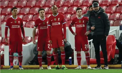  ??  ?? Jürgen Klopp prepares to bring on four substitute­s during Liverpool’s Champions League game at home to Atalanta in November. That is still not allowed in the Premier League. Photograph: Laurence Griffiths/PA