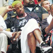  ?? Eric Draper / Associated Press ?? The Spurs could tolerate Dennis Rodman’s tattoos, different hair colors and piercings, but not his disruptive behavior.