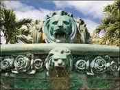  ??  ?? Lions on a fountain in Kelsey Park in Lake Park.