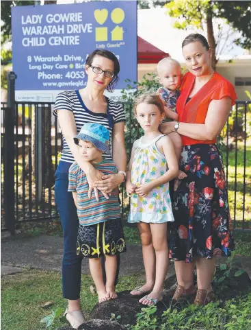  ?? Picture: BRENDAN RADKE ?? DETERMINED: Belinda Gill with her children Fletcher, 3, and Olivia, 6, and Rebecca Wright with Toby, 15 months, want the Lady Gowrie Waratah Child Centre to remain open.