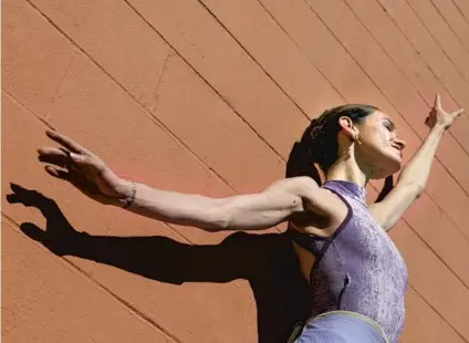  ?? Photograph­s by Michael Blackshire Los Angeles Times ?? PETRA CONTI and her husband hold faculty positions at Pasadena Civic Ballet, where she poses for a portrait before rehearsals.