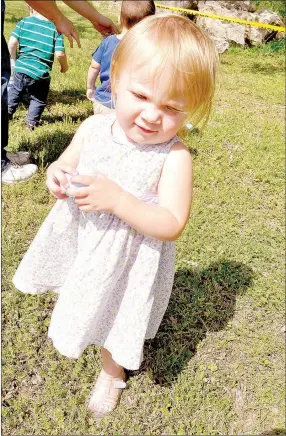  ?? RACHEL DICKERSON/MCDONALD COUNTY PRESS ?? Molly Potter holds an egg during the Noel Easter egg hunt.