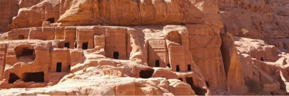  ?? JOANNE BLAIN PHOTOS FOR THE TORONTO STAR ?? A view of the Rose-Red City of Petra. The site should have been packed with tourists, but visitors were almost outnumbere­d by locals offering camel rides and hawking souvenirs.