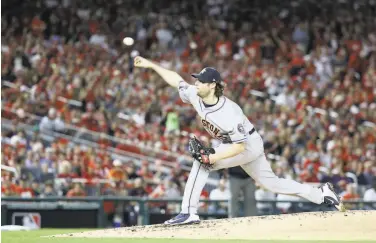  ?? Rob Carr / Getty Images ?? A free agent this offseason, Gerrit Cole allowed three hits and a run in seven innings against Washington. Cole has gone at least seven innings in each of his five starts this postseason with an ERA of 1.72.