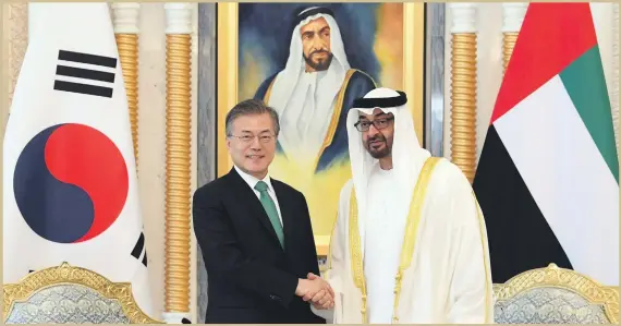  ?? EPA ?? Sheikh Mohammed bin Zayed, Crown Prince of Abu Dhabi and Deputy Supreme Commander of the Armed Forces, greets South Korean President Moon Jae-in yesterday ahead of a summit in Abu Dhabi.