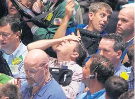  ?? AFP ?? Escenas de angustia en la Bolsa de Wall Street