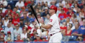  ?? MATT SLOCUM —THE ASSOCIATED PRESS ?? Phillies outfielder Jay Bruce reacts after striking out against the Dodgers in the first inning Tuesday night. Bruce would leave the game with a ribcage injury. Luckily for him, it’s not a dreaded oblique strain.