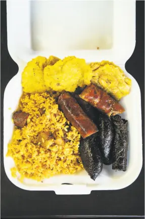  ??  ?? At the rancho, deep red longaniza and deep black morcilla are served with rice and tostones.