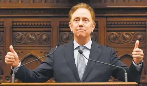  ?? Jessica Hill / Associated Press ?? Gov. Ned Lamont delivers the State of the State during the opening session of the legislatur­e at the state Capitol on Wednesday in Hartford.