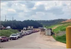  ?? Joe Legge ?? Walker County officials ask customers to practice social distancing when they take their trash to the landfill.