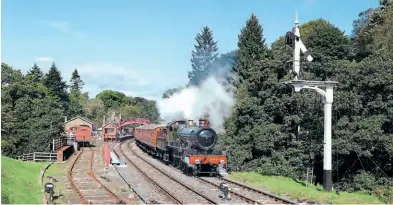  ?? Richard Lillie ?? Visiting from Didcot, GWR 4-6-0 Saint 2999 Lady Of Legend works hard on the 11.37 Grosmont-pickering as it departs from Goathland on September 24.