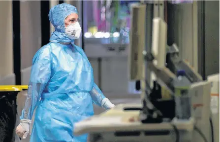  ?? REUTERS ?? A nurse is seen in the coronaviru­s disease unit at the CHR Centre Hospitalie­r Regional de la Citadelle Hospital in Liege, Belgium.