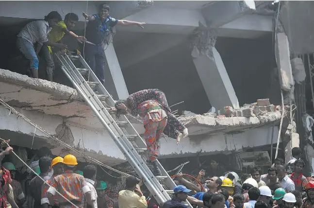  ?? MUNIR UZ ZAMAN / AFP / Getty
Images ?? The Rana Plaza collapse in Bangladesh on April 24, 2013 killed about 1,130 and injured another 2,520. The injured, and the estates of those killed, havefiled a class action suit against Loblaw Cos. Ltd. and its Joe Fresh brand in Canada, while a separate suit has been filed against U.S. retailers.
