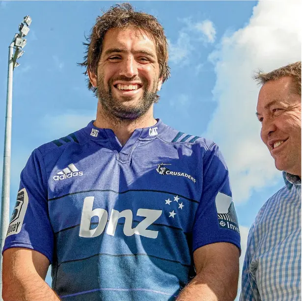  ??  ?? All Blacks lock Sam Whitelock shares a joke with head coach Steve Hansen.