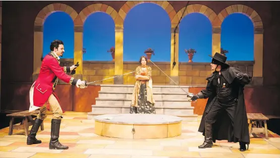  ?? BENJAMIN LAIRD ?? Tyrell Crews, Mabelle Carvajal and Derek Flores cross swords in the Alberta Theatre Projects production of Zorro: Family Code.