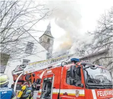  ?? FOTO: DPA ?? Brand der Kirche St. Jodok in Ravensburg. Der Tatverdäch­tige sei kein „unbeschrie­benes Blatt“, so die Staatsanwa­ltschaft.