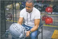  ?? RANDY RONQUILLO/VICIS INC. VIA AP ?? The Seahawks’ Doug Baldwin talks about the new VICIS Zero 1 helmet that teams will be trying out at minicamp. The Zero 1 is the first to account for rotational as well as linear impact. Scientific studies have indicated that rotational impact has more...