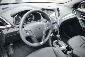  ??  ?? The instrument­ation and layout in the 2017 Santa Fe is clear and business-like. The controls are decently illuminate­d at night.