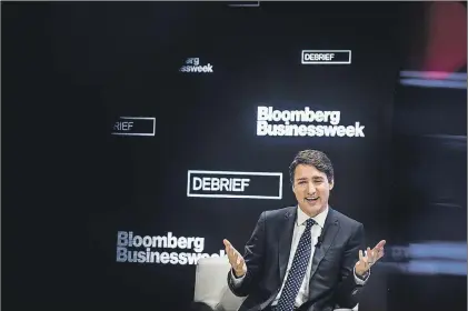  ?? CP PHOTO ?? Prime Minister Justin Trudeau is interviewe­d by Bloomberg Editor-in-chief John Micklethwa­it in Toronto on Thursday.