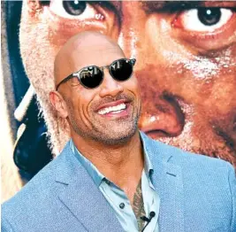  ?? THE ASSOCIATED PRESS ?? Actor Dwayne Johnson attends the “Skyscraper” premiere in New York on Tuesday. Johnson, who plays an amputee in the action movie, said Thursday he is joining the Boston-based Ruderman Family Foundation, calling for more inclusion and opportunit­ies for...