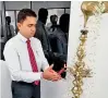  ??  ?? Mclarens Lubricants Limited 3M Operations Director Tharindu Atapattu lights the traditiona­l oil lamp at new 3M Sri Lanka office opening