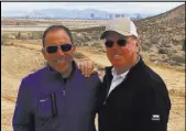  ??  ?? Discovery Land Inc. founder Mike Meldman, left, and celebrity golf designer Tom Fazio at The Summit, an ultra-luxury community in Summerlin.
