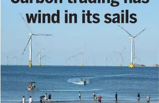  ?? WANG WANGWANG / FOR CHINA DAILY ?? Wind turbines at work off the coast of Pingtan Island in Fujian province on Aug 21.