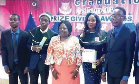  ??  ?? L-R: An English teacher at ChristHill College, Lagos, Mr. Maxwell Ewedoma, Head boy, Master Daniel Adekunle, Director of the School, Mrs. Omotunde Lawson, Head girl , Miss Emmanuella Osuofia and the Principal, Mr. Edosa Omoregie during the college’s...