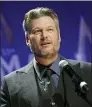  ?? PHOTO BY EVAN AGOSTINI — INVISION — AP, FILE ?? Singer Blake Shelton speaks after winning single of the year award for “God’s Country” at the 53rd annual CMA Awards in Nashville, Tenn.