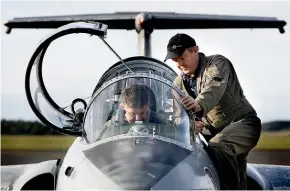  ?? MATT SCOTT/STUFF ?? Local pilot Brett Emeny, right, teaches New Zealand Warbirds Associatio­n president Gavin Tretheway the intricacie­s of the Aero Vodochody L29 Delfin at New Plymouth airport. (File photo)