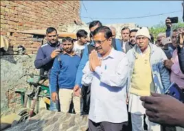 ?? HT PHOTO ?? Delhi chief minister Arvind Kejriwal at the house of Rajesh Kumar, who died in police custody, in Jhajjar on Monday.