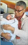  ?? Picture: WERNER HILLS ?? IN GOOD HANDS: Dora Nginza neonatal ward nursing manager Violet Jezile with the baby born with a rare condition