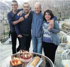  ?? FAMILY OF KAVOUS SEYED-EMAMI VIA THE ASSOCIATED PRESS ?? The late Iranian-Canadian professor Kavous SeyedEmami, second right, and his wife, Maryam Mombeini, right, and their two sons.
