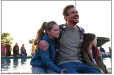  ??  ?? Great-hearted but troubled Dane (Jason Segel) comforts his friends’ daughters Molly (Isabella Kai) and Evie (Violet McGraw) in Gabriela Cowperthwa­ite’s tragic, drawn-from-life medical drama “Our Friend.”